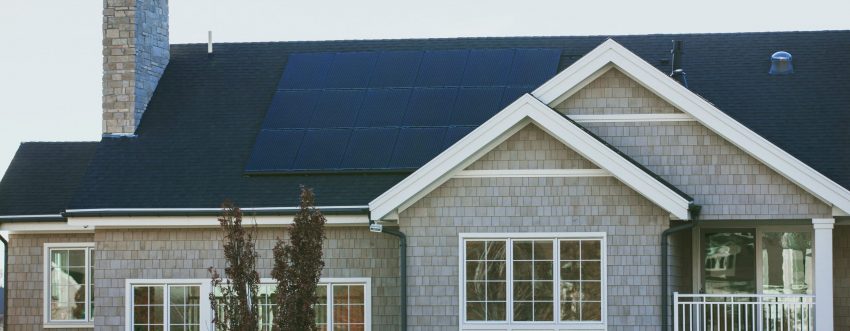 An apartment block featuring solar power. Photo by Vivint Solar on Unsplash.com